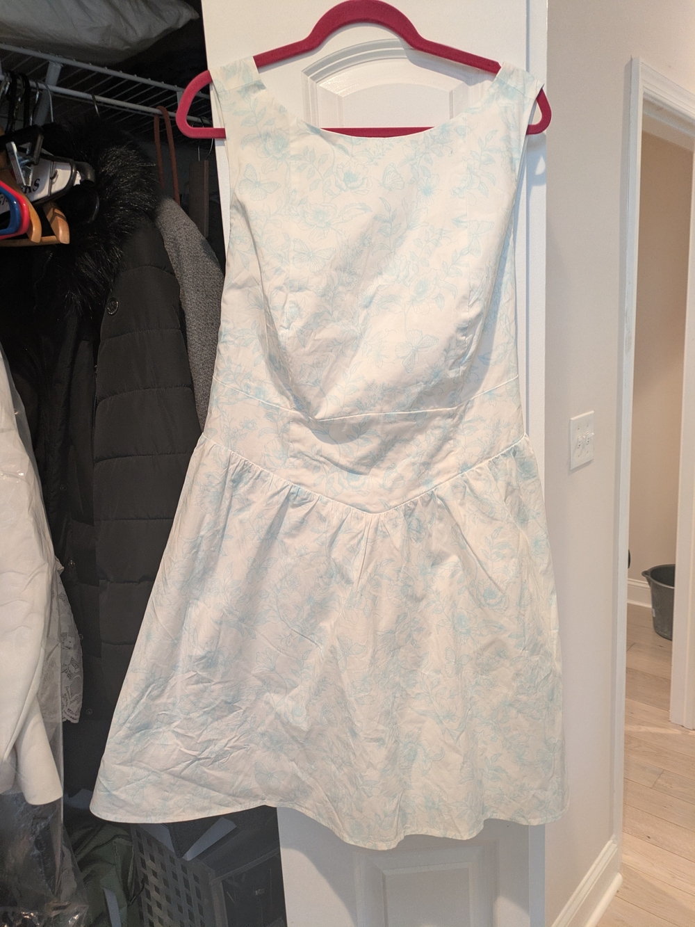 Sleeveless White Dress with Light Blue Floral Print